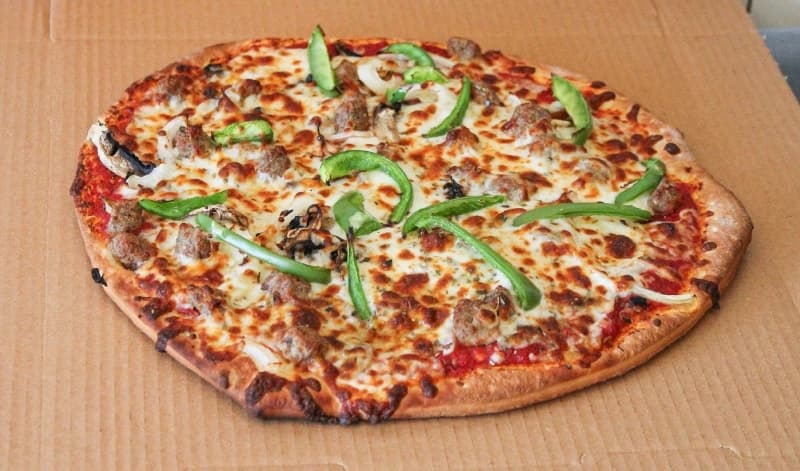 The Fabulous Four pizza comes with green peppers, mushrooms, sausage and onions.