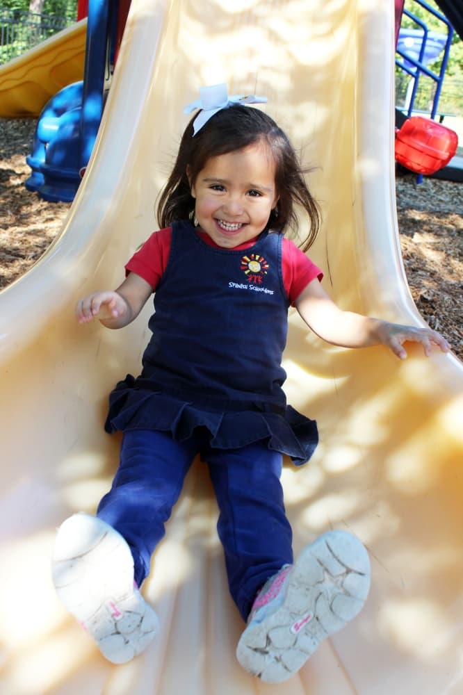 little girl on slide