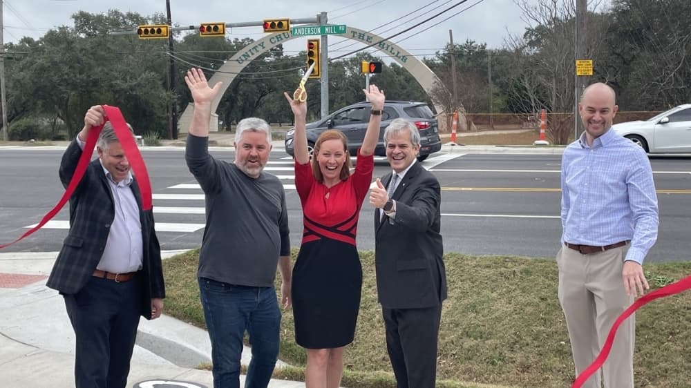 Austin officials hold ribbon cutting signaling end of construction on Anderson Mill Road