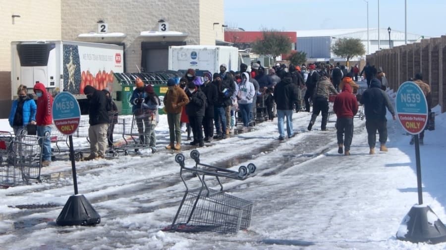 Austin residents wait in line for groceries Feb. 16. (Community Impact Newspaper)