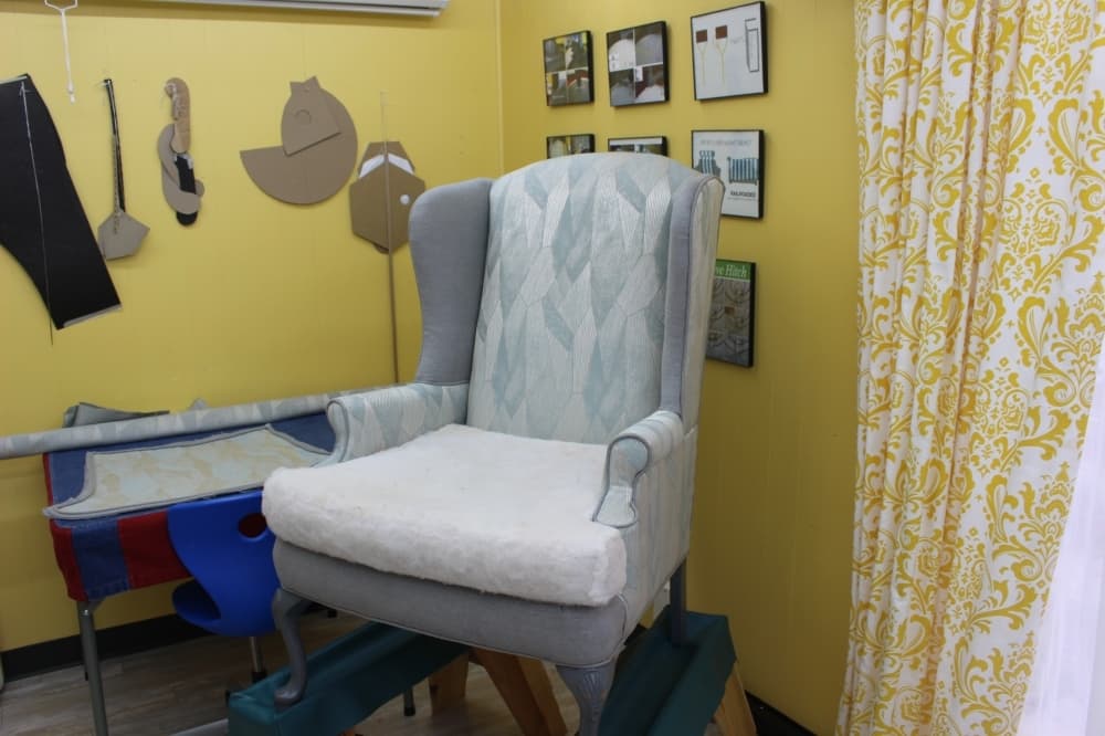 The chair is a work in progress by one of Brunetti's students. (Sierra Rozen/Community Impact Newspaper)