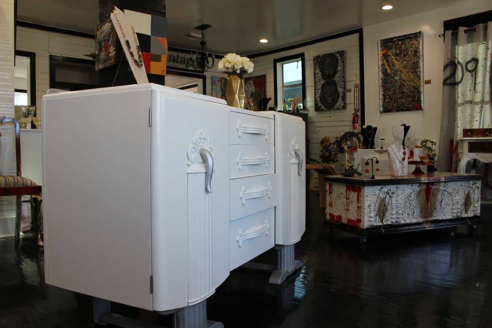 209th Design House specializes in lacquer refinishing on furniture, custom furniture and upholstery. (Chandler France/Community Impact Newspaper)