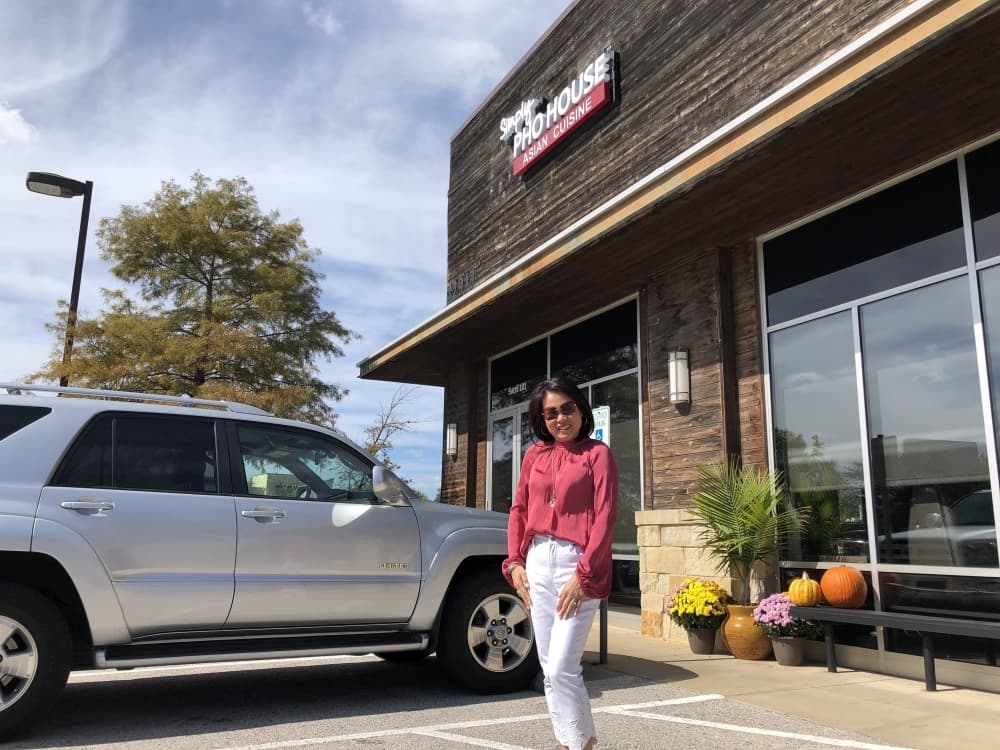 woman outside restaurant