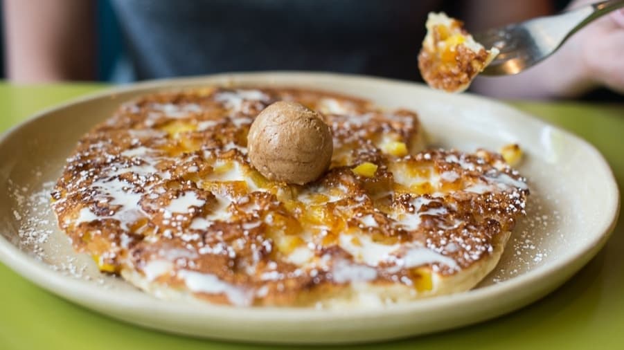 Several breakfast dishes, such as a pineapple pancake, are included on the menu at Snooze A.M. Eatery. (Courtesy Snooze A.M. Eatery)