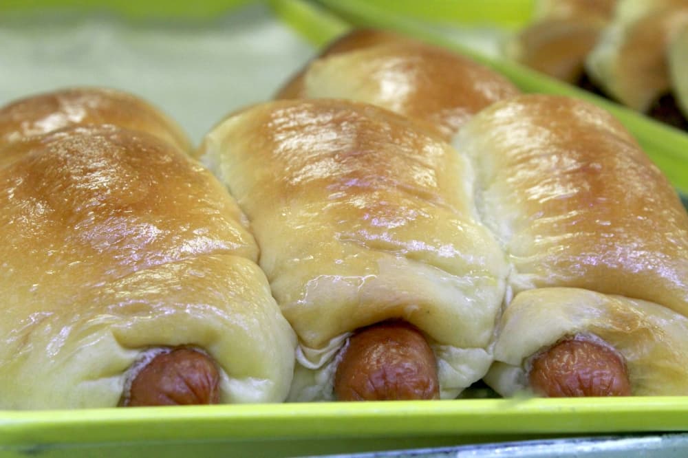 Sweet Spot Donuts offers sausage rolls wrapped in sweet bread. (Sandra Sadek/Community Impact Newspaper)