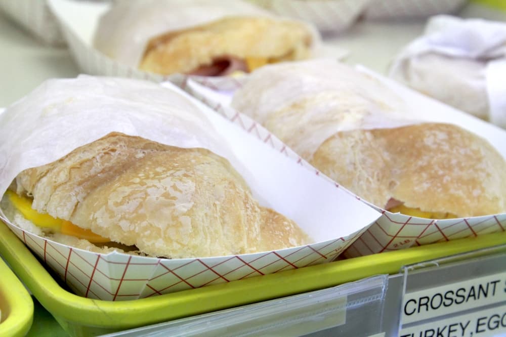 Along with donuts and sausage rolls, the donut shop also sells breakfast sandwiches. (Sandra Sadek/Community Impact Newspaper)