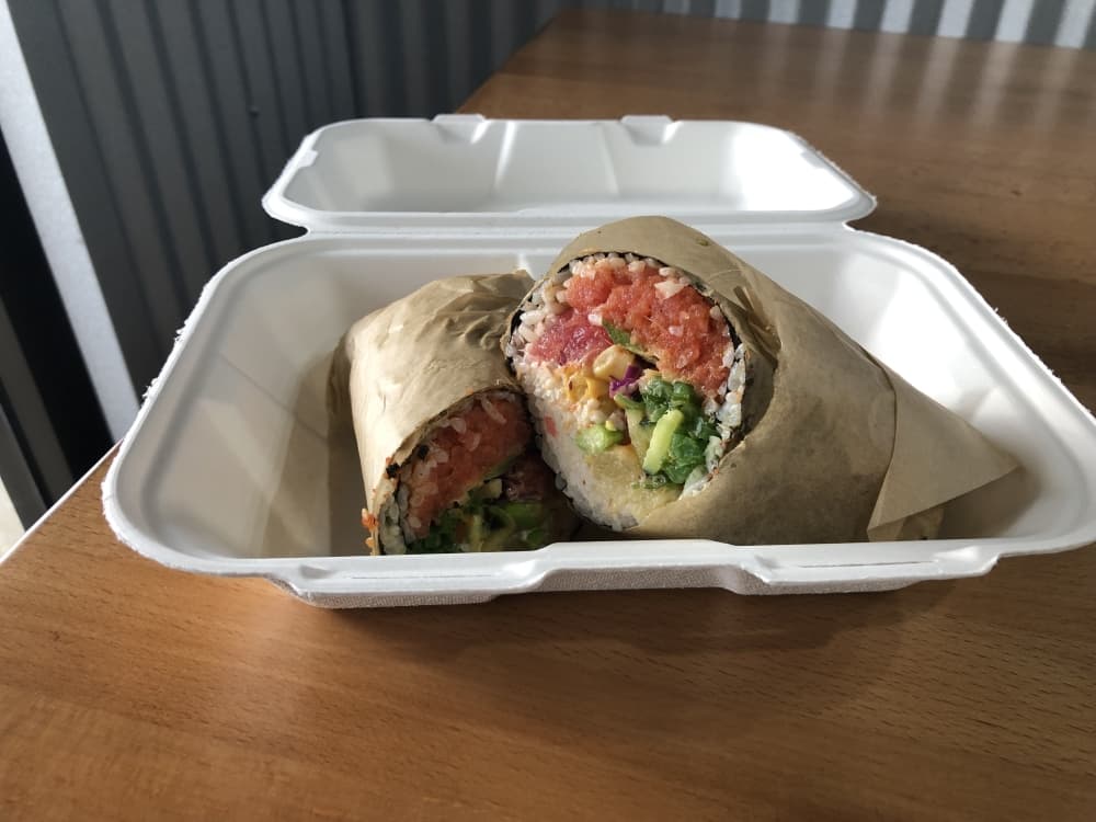 The Pokerrito is a burrito featuring poke and wrapped in seaweed or Flamin' Hot Cheetos wrap. (Grace Dickens/Community Impact Newspaper)