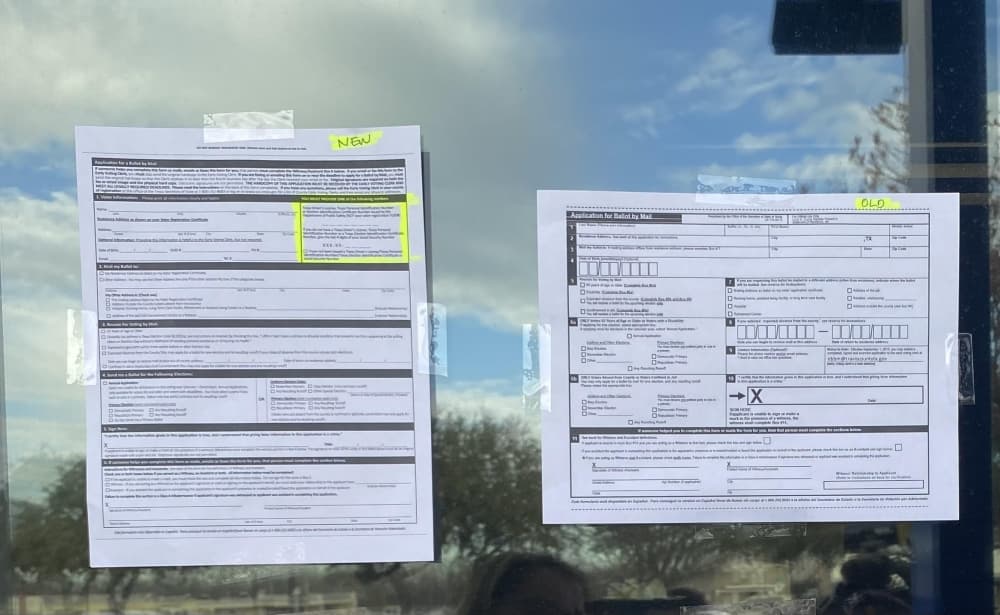 The clerk's office posted the new and old ballot applications for the Jan. 18 press conference. (Darcy Sprague/Community Impact Newspaper)