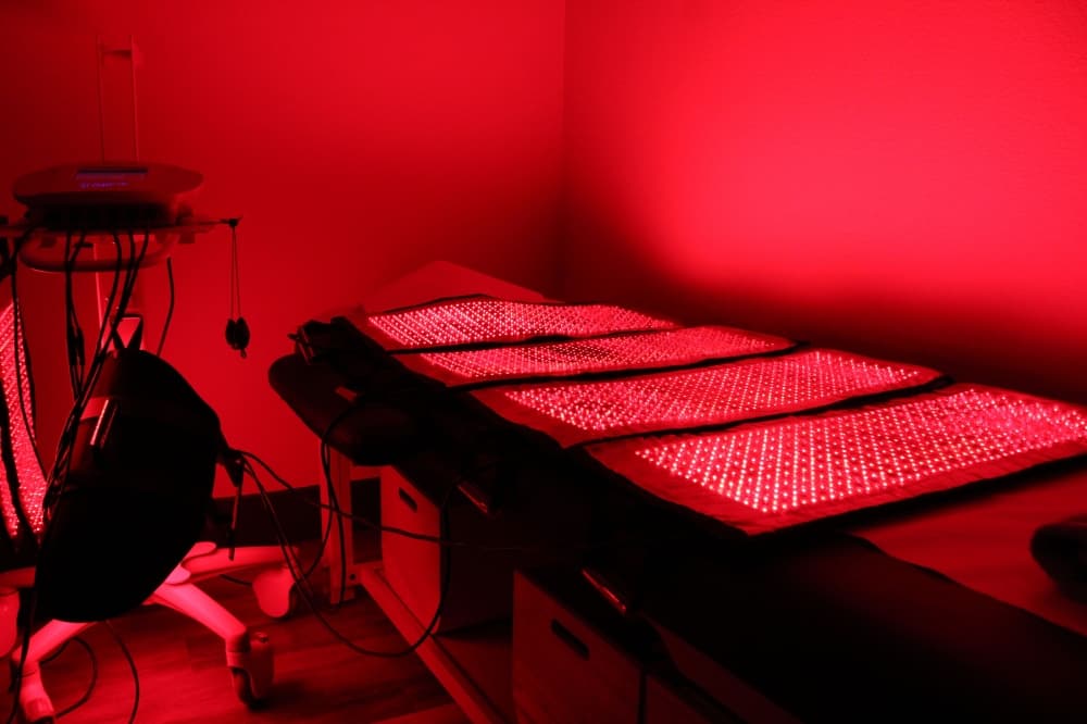 empty patient room with red lighting