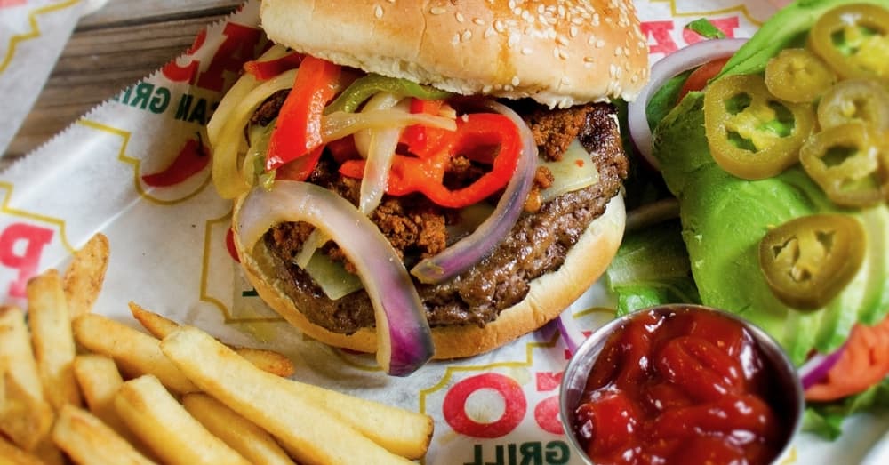 Mexican burger ($14.99): A half-pound beef patty is topped with jalapenos, avocado, onions, chorizo and cheese. (Courtesy El Paso Mexican Grill)