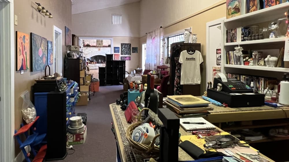 The store sells a variety of items including clothing, accessories, furniture, dishes and other household goods. (Grace Dickens/Community Impact Newspaper)