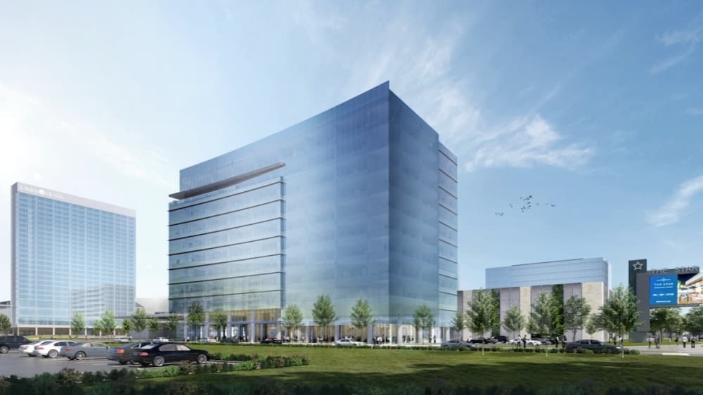 An 11-story, 313,000-square-foot office tower is set to be complete by the first quarter of 2023 at The Star on the northeast corner of Dallas North Tollway and Cowboys Way, Frisco. (Rendering courtesy HKS Architects)