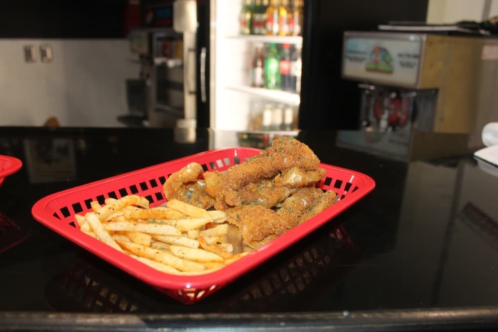 Fried catfish ($12.50) comes with a side of fries. (Sierra Rozen/Community Impact Newspaper)