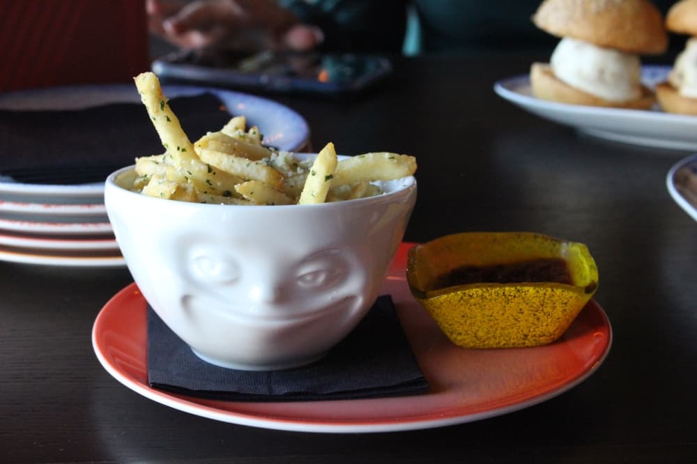 The truffle fries are one of many options on the starters menu. (Sofia Gonzalez/Community Impact Newspaper)