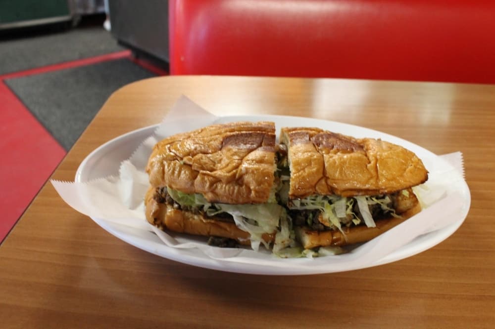 Torta: A sandwich is served with a choice of meat with avocado and beans on the bottom of the bun. ($9.49-10.49)