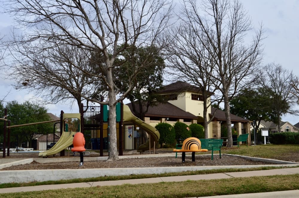 The neighborhood has a community playground and pool. 