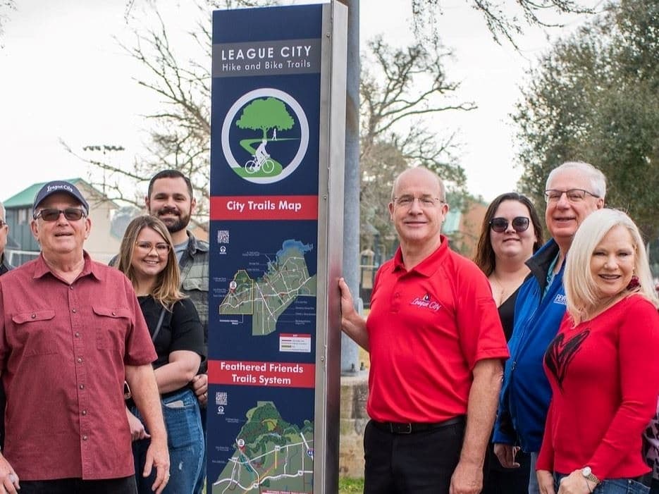 League City renaming and signing hike and bike trails