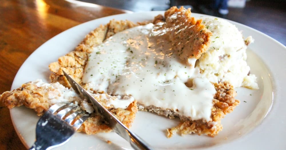 Chicken fried steak ($18.75): This tenderized steak is fried and served with mashed potatoes and gravy. (Emily Lincke/Community Impact Newspaper)