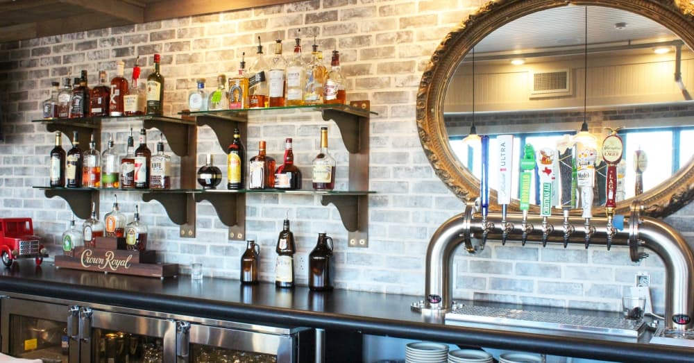 Modern additions to the historical structure include a rooftop patio and upstairs bar, which hosts live music. (Emily Lincke/Community Impact Newspaper)