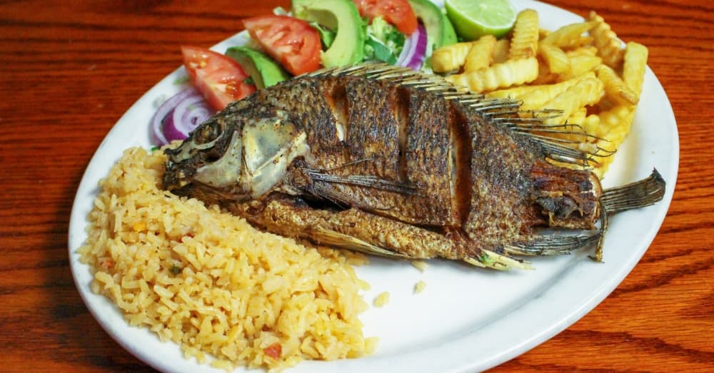 Mojarra Frita ($16.95): A whole tilapia fish is cleaned, scored and deep fried. (Wesley Gardner/Community Impact Newspaper)
