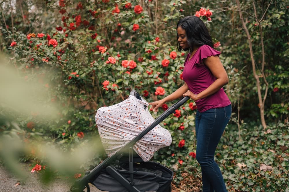 The business offers a versatile baby cover called "Milk Snob" designed to cover your baby from the outside world. (Courtesy Babette Bevan/Milk Snob)