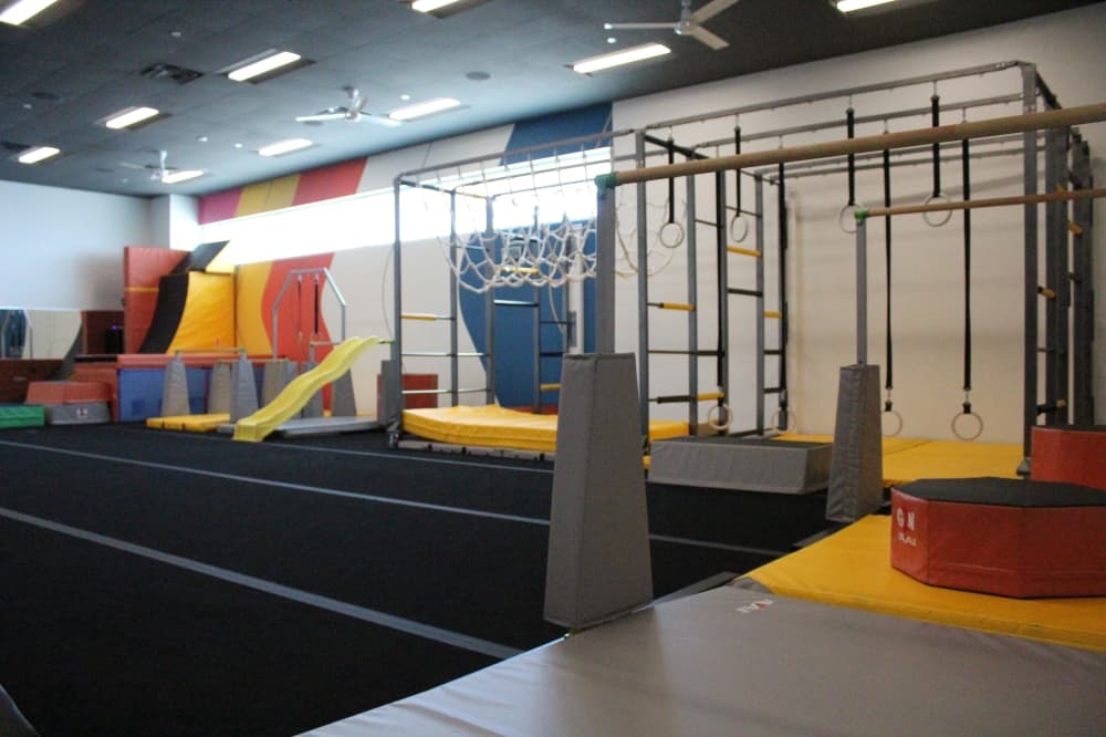 The ninja studio at the YMCA features various obstacles that can be moved around and changed to provide children with a different challenge for each visit. (Mikah Boyd/Community Impact Newspaper)