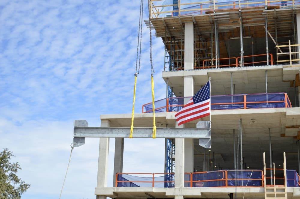 Dell Children's North Medical Center celebrated a construction milestone March 2 with the final steel beam added to the new pediatric hospital in Northwest Austin. (Taylor Girtman/Community Impact Newspaper)