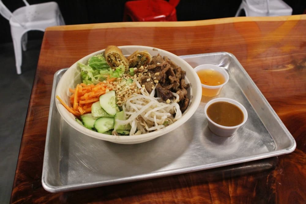 Vietnamese Pork Noodle ($10.45) has charred pork seasoned in traditional Vietnamese spices on top of white rice or vermicelli noodles. (Jackson King/Community Impact)