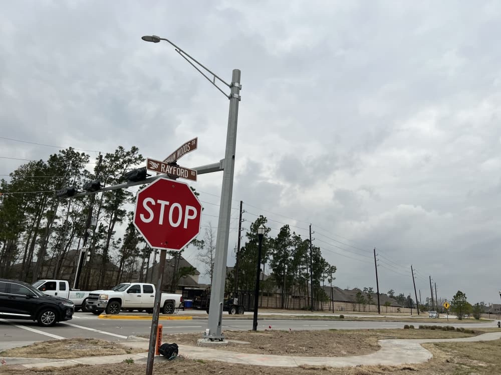 Traffic signal work completes Rayford Road widening at Birnham Woods Drive