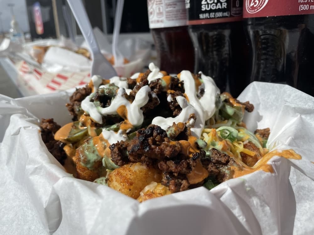 Totchos ($12) are nachos but with tater tots instead of chips. (Andy Yanez/Community Impact Newspaper)