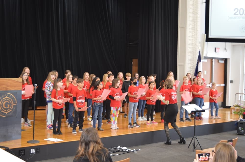 McCoy Elementary Honor Choir performs "Goodbye Yellow Brick Road" at the 2022 GISD State of the District. (Hunter Terrell/Community Impact Newspaper)