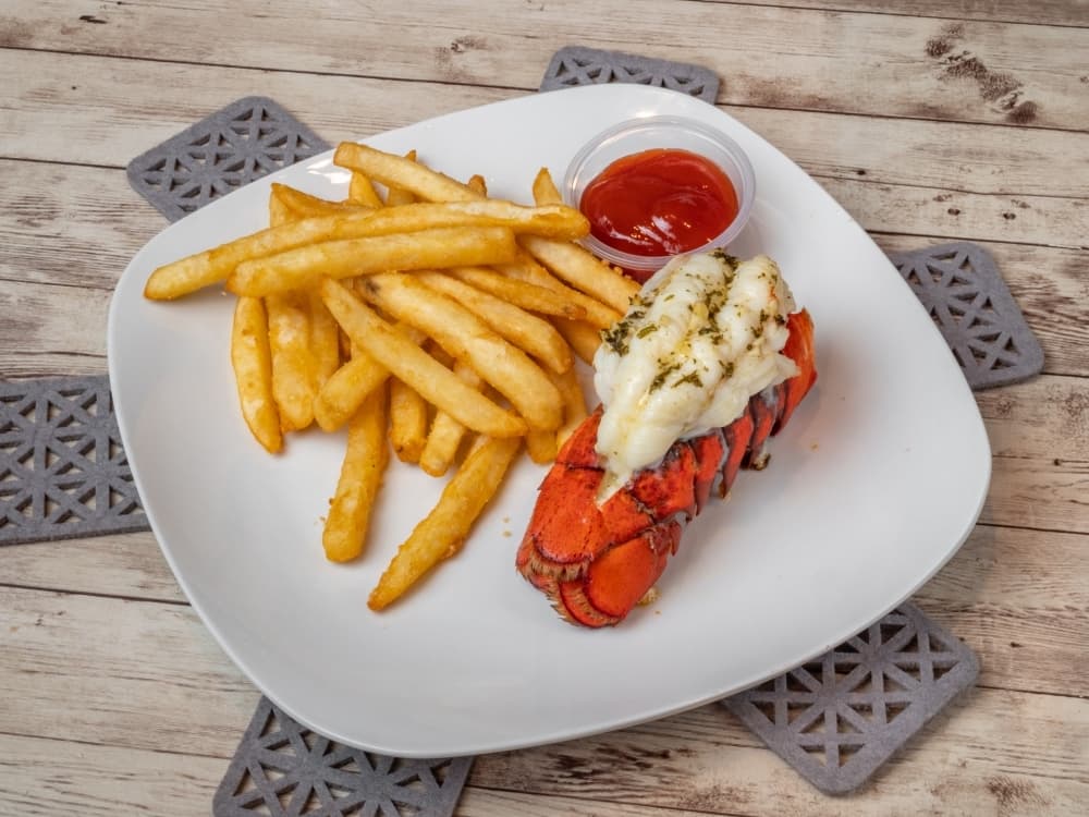 The One Lobster Tail is served with fries for $18.99. (Courtesy The One Crawfish & Seafood)