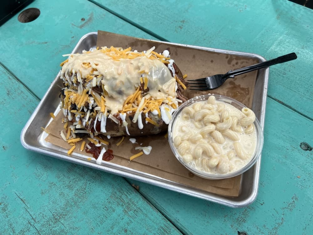 Texas Trinity baked potato with a side of mac-n-cheese from Louie's Craft BBQ.