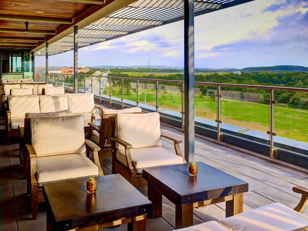 Drinks will be served on the Meridian 98 patio which has views of the Hill Country.