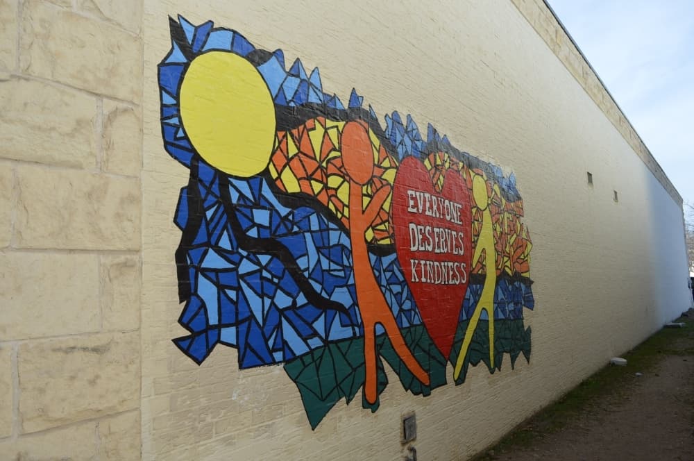 The mural "Everyone Deserves Kindness" by Peyton Vega will be expanded upon over the next five years due to an interlocal agreement between the GAC Board and GISD. (Hunter Terrell/Community Impact Newspaper)
