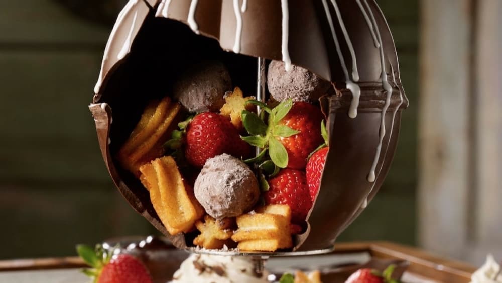 A Chocolate Piñata featuring a handmade chocolate globe filled with churros and berries will be on the menu at Uncle Julio's in Frisco. (Courtesy Uncle Julio's)