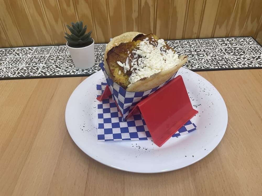 The Arepa Pabellon contains shredded beef, black beans, white cheese and plantain ($10.99). (Eddie Harbour/Community Impact Newspaper)