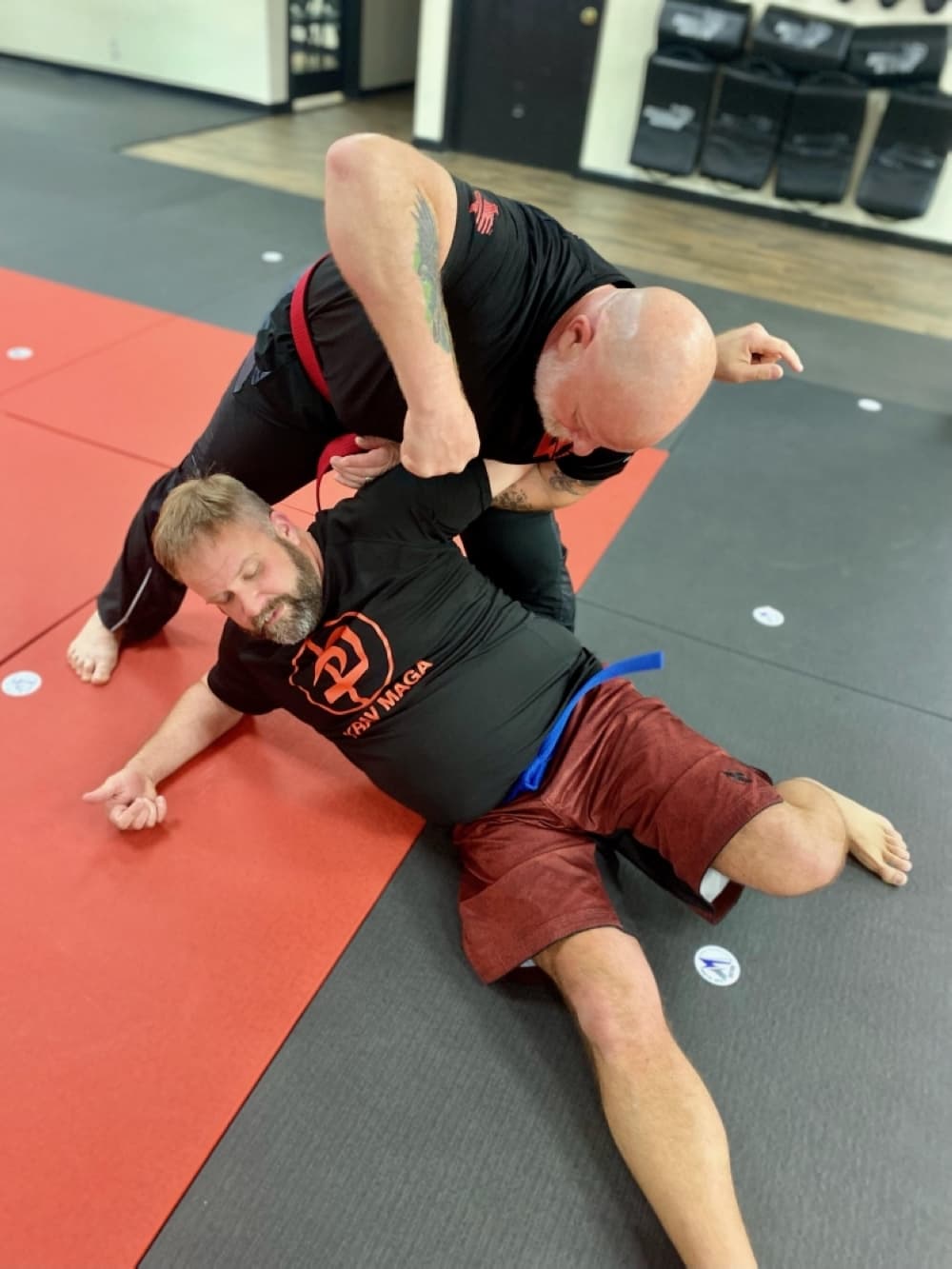 Two adult students from the teen and adult classes practicing Krav Maga. (Courtesy Valor Martial Arts)