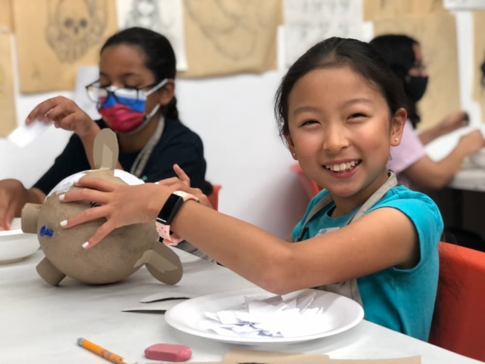 kids doing papier mache