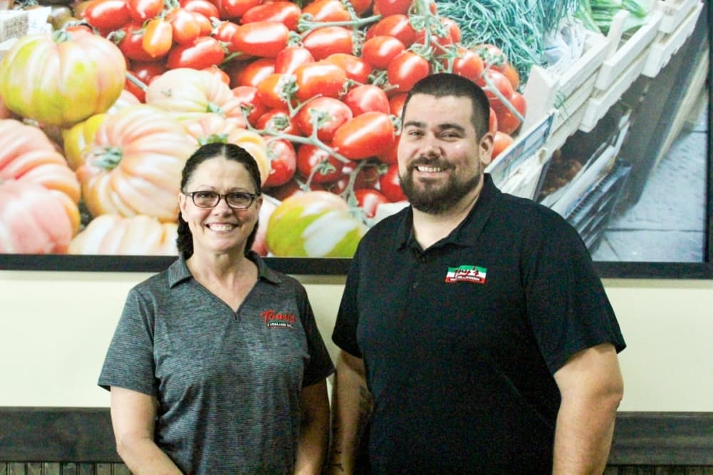 Tony's Italian Delicatessen Owner Lori Hutchison runs three restaurant with the help of employees such as Rob Boyd, general manager of the Spring location. (Emily Lincke/Community Impact Newspaper)