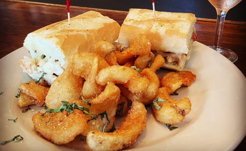Pesto chicken sandwich ($9.95): This chicken sandwich features roasted red pepper pesto and melted mozzarella.(Courtesy Amedeo's Italian Restaurant)
