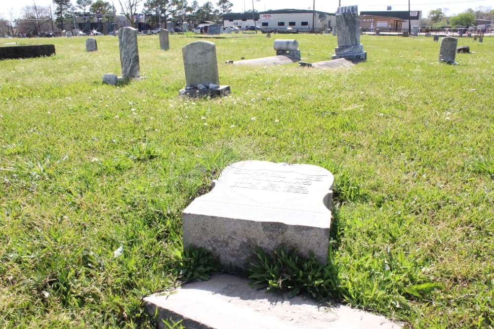 The cemetery is the final resting place for several Civil War and World War I military veterans, with many of the headstones having fallen over time. (Hannah Zedaker/Community Impact Newspaper) 