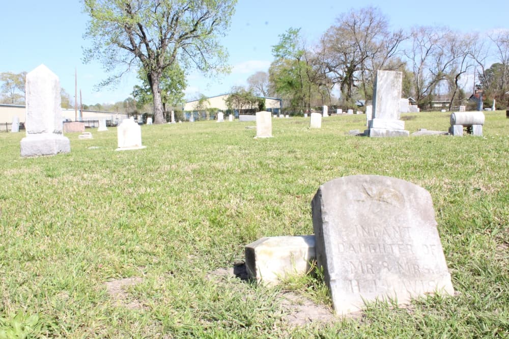 The cemetery is the final resting place for several Civil War and World War I military veterans with many of the headstones having fallen over time. (Hannah Zedaker/Community Impact Newspaper)