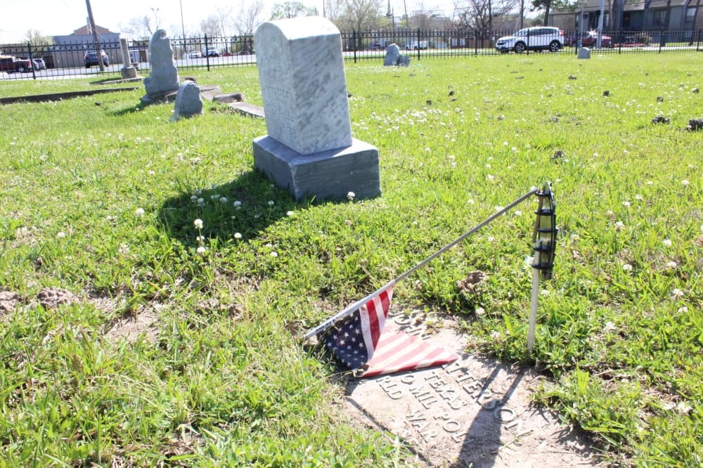 The cemetery is the final resting place for several Civil War and World War I military veterans with many of the headstones having fallen over time. (Hannah Zedaker/Community Impact Newspaper)