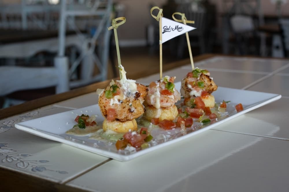 The Sal-O-Mon appetizer packs a punch with chipotle sauce and spicy avocado salsa.