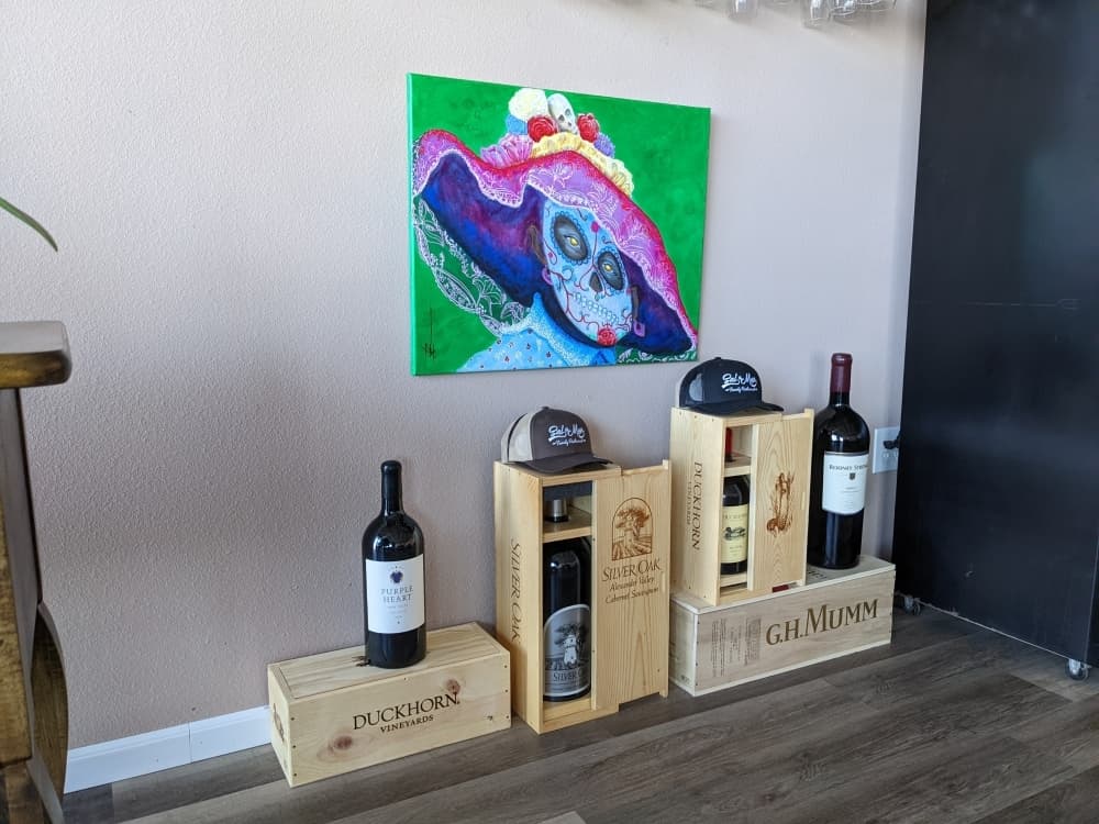 Paintings by a local artist on display are available for purchase.