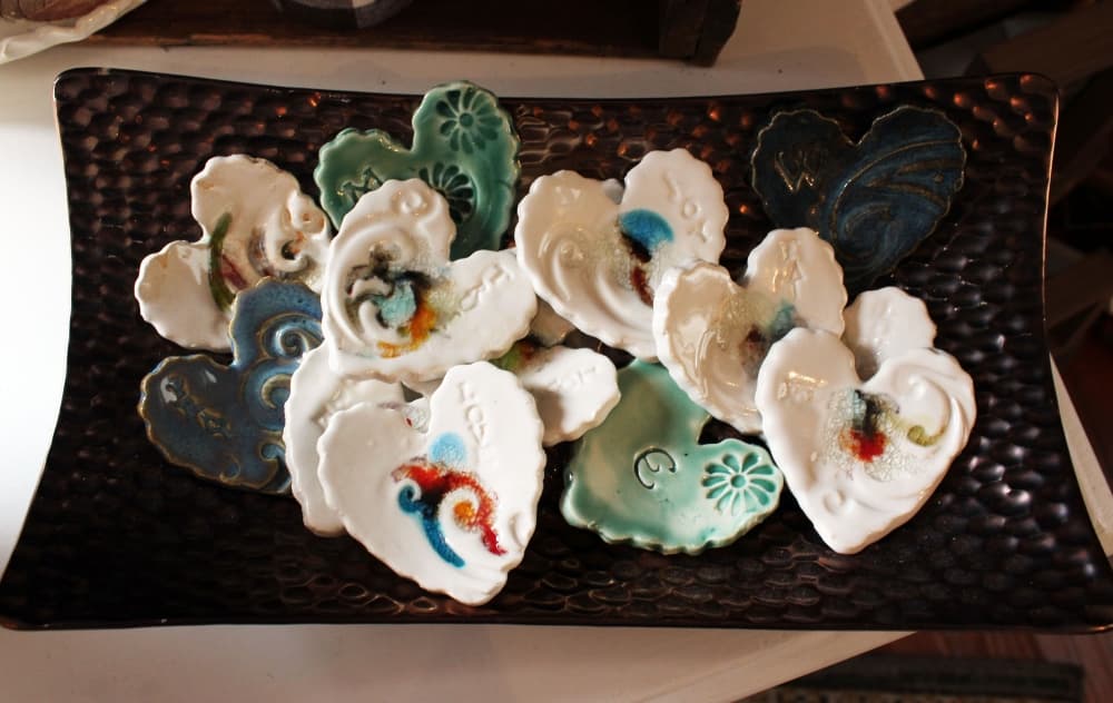 The gift shop sells pottery hearts from artist Kash Mistry for $5. (Karen Chaney/Community Impact Newspaper)