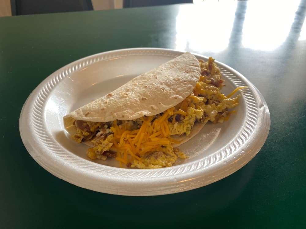 Amigo's is also known for its breakfast tacos. Pictured here is the bacon, egg and cheese taco. $3.54 (Brooke Sjoberg/Community Impact Newspaper)