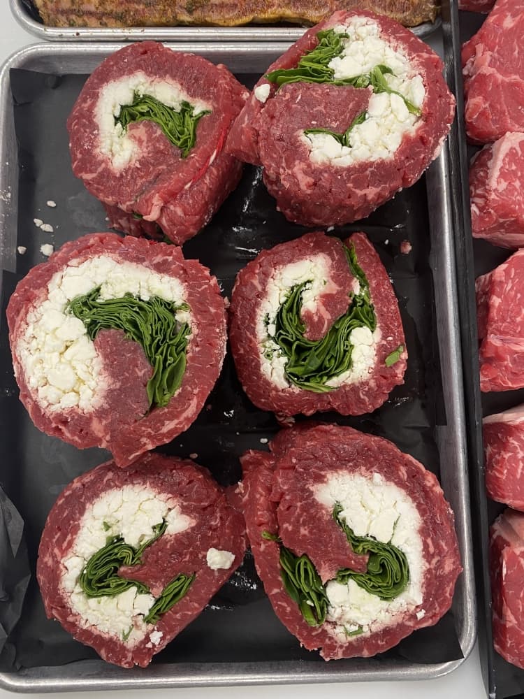 Speciality items like beef pinwheels are offered at the local meat market. (Samantha Douty/ Community Impact Newspaper)