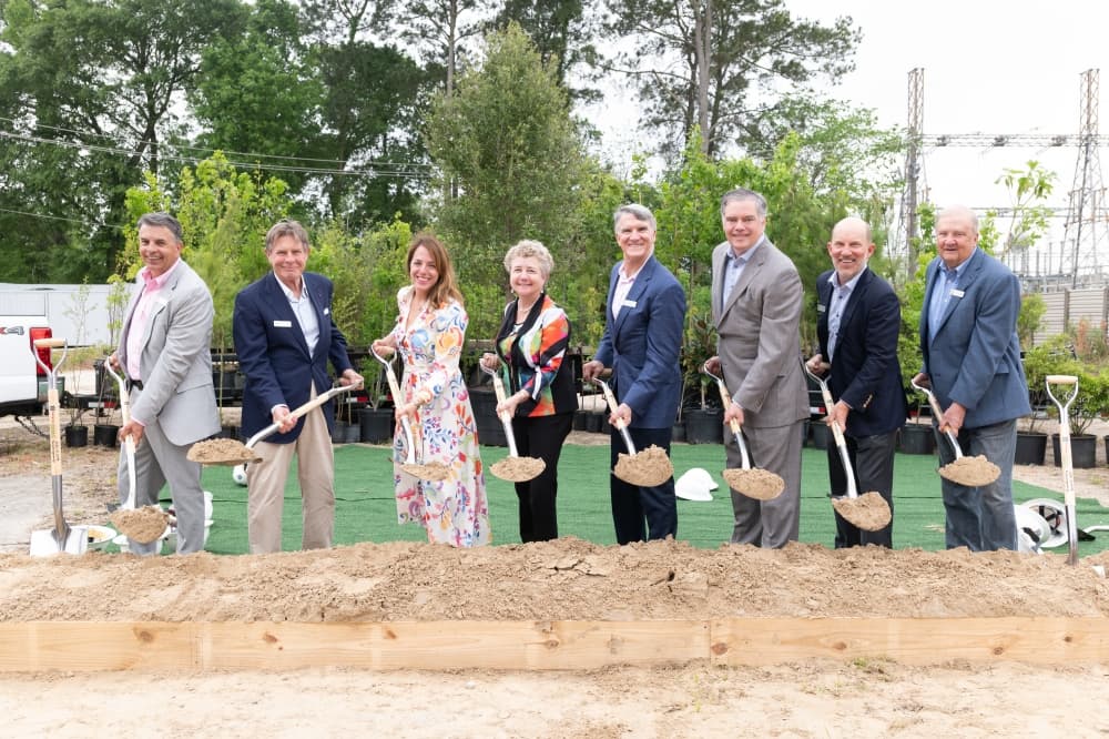 From left: Barry Ward, Mack Fowler, Laura Mayer, Sheila Condon, Larry Nettles, Doug Bauer, Andrew McCullough and David Graham break ground on the new Trees for Houston Campus on April 13. (Courtesy David Ortiz)